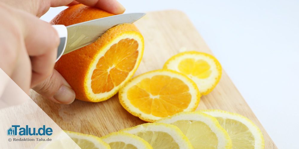 Orange und Zitrone schneiden