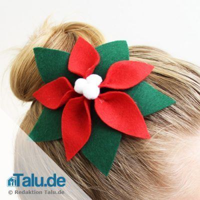 Weihnachtsstern als Haarschmuck