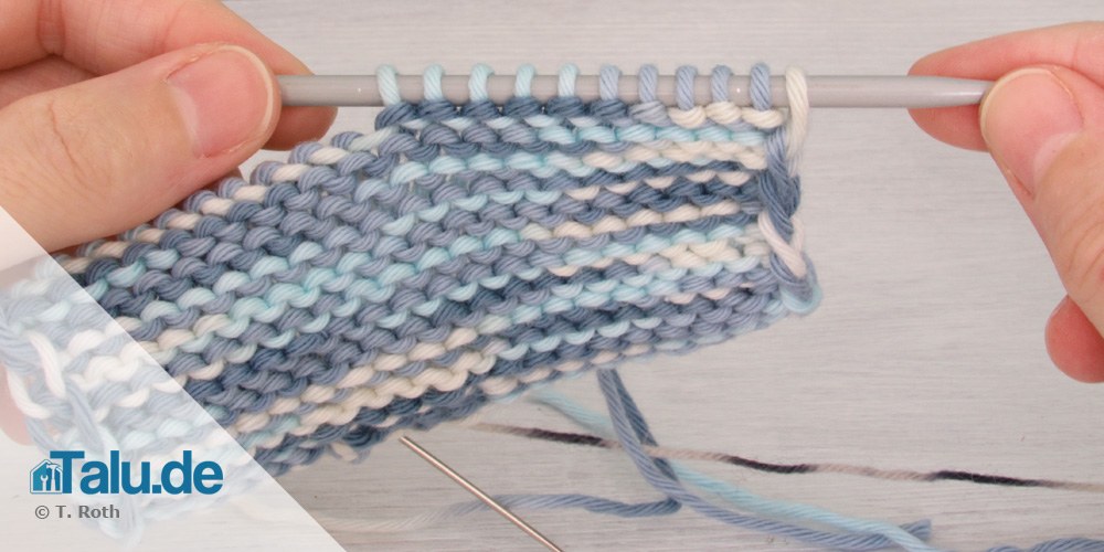 Senkrechtes Knopfloch stricken