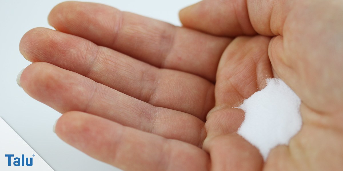 Hand mit Natron