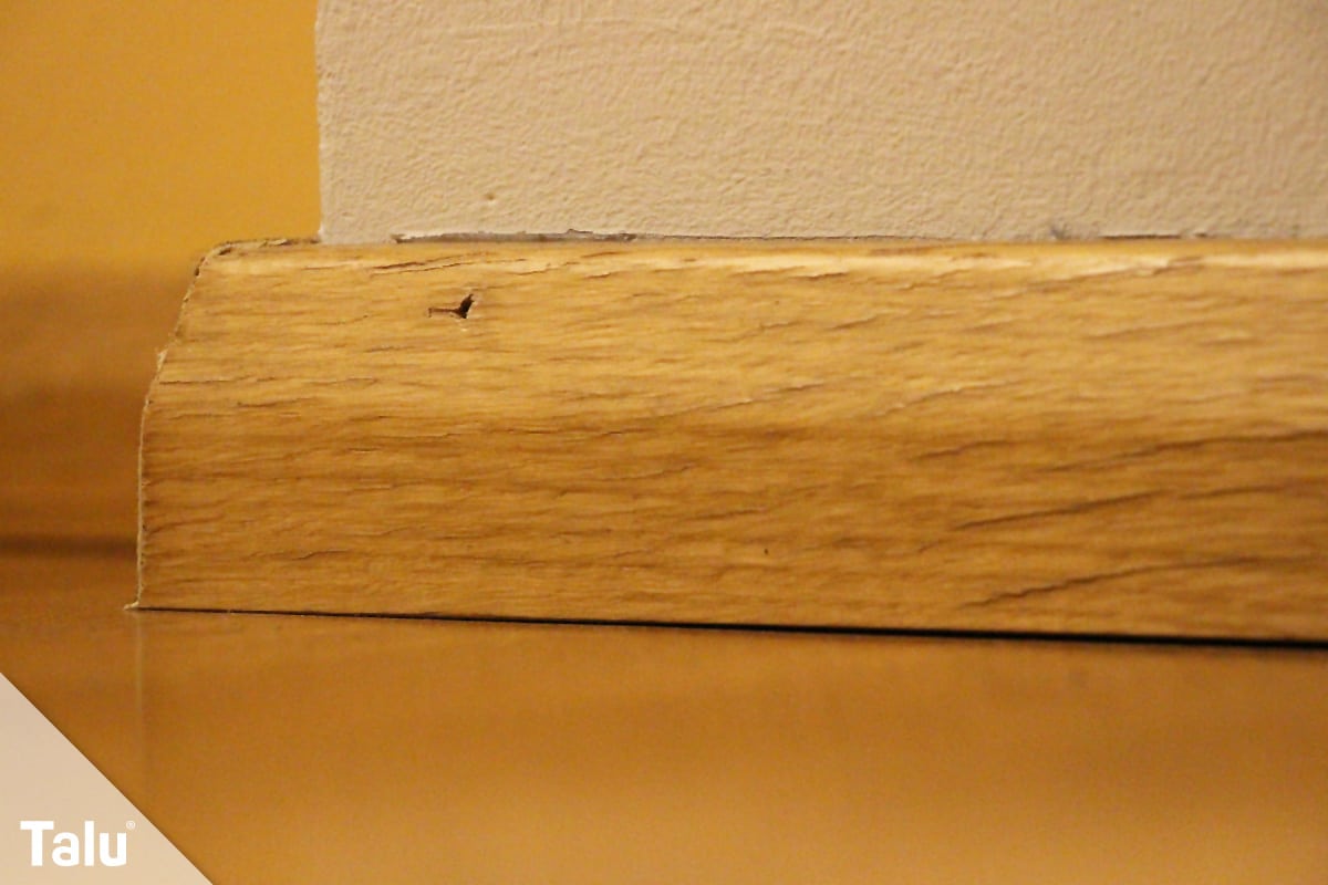 Vinylboden verlegen, Sockelleiste aus Holz