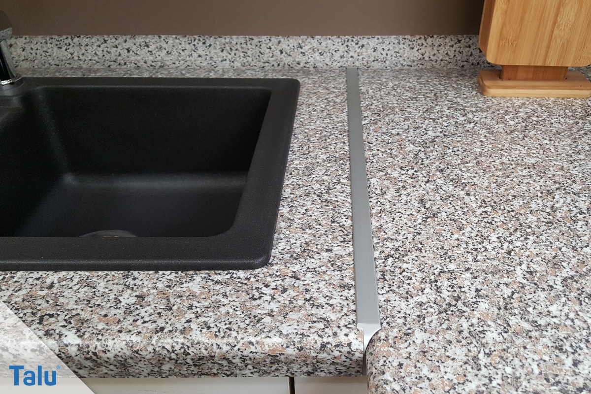 Greift Essig Waschmaschine und Co. an, Arbeitsplatte aus Naturstein