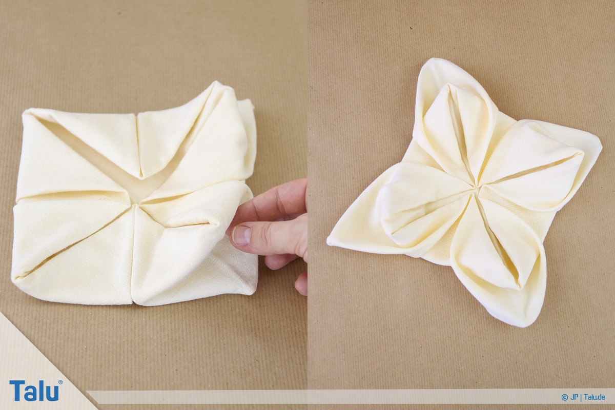 Stoffservietten falten, Seerose fertig gefaltet aus einer Stoffserviette