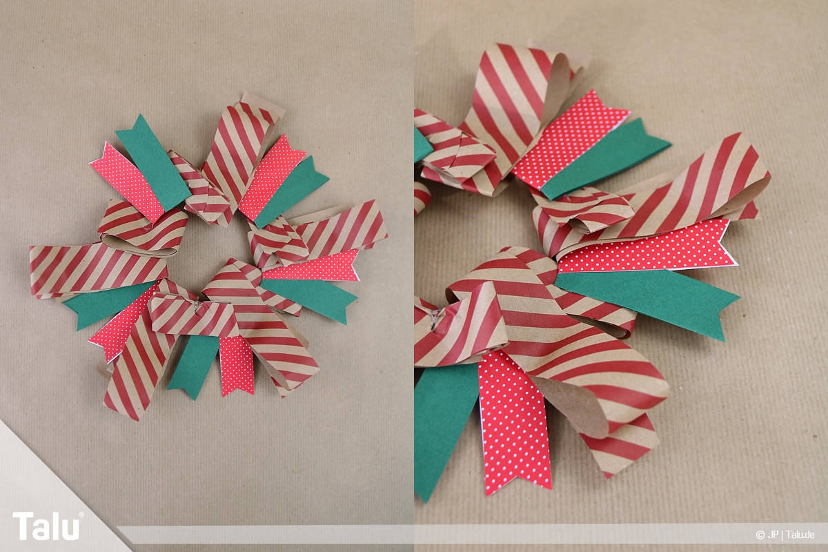 Basteln mit Papier an Weihnachten, Ideen, fertig gebastelter Adventskranz aus Papierstreifen