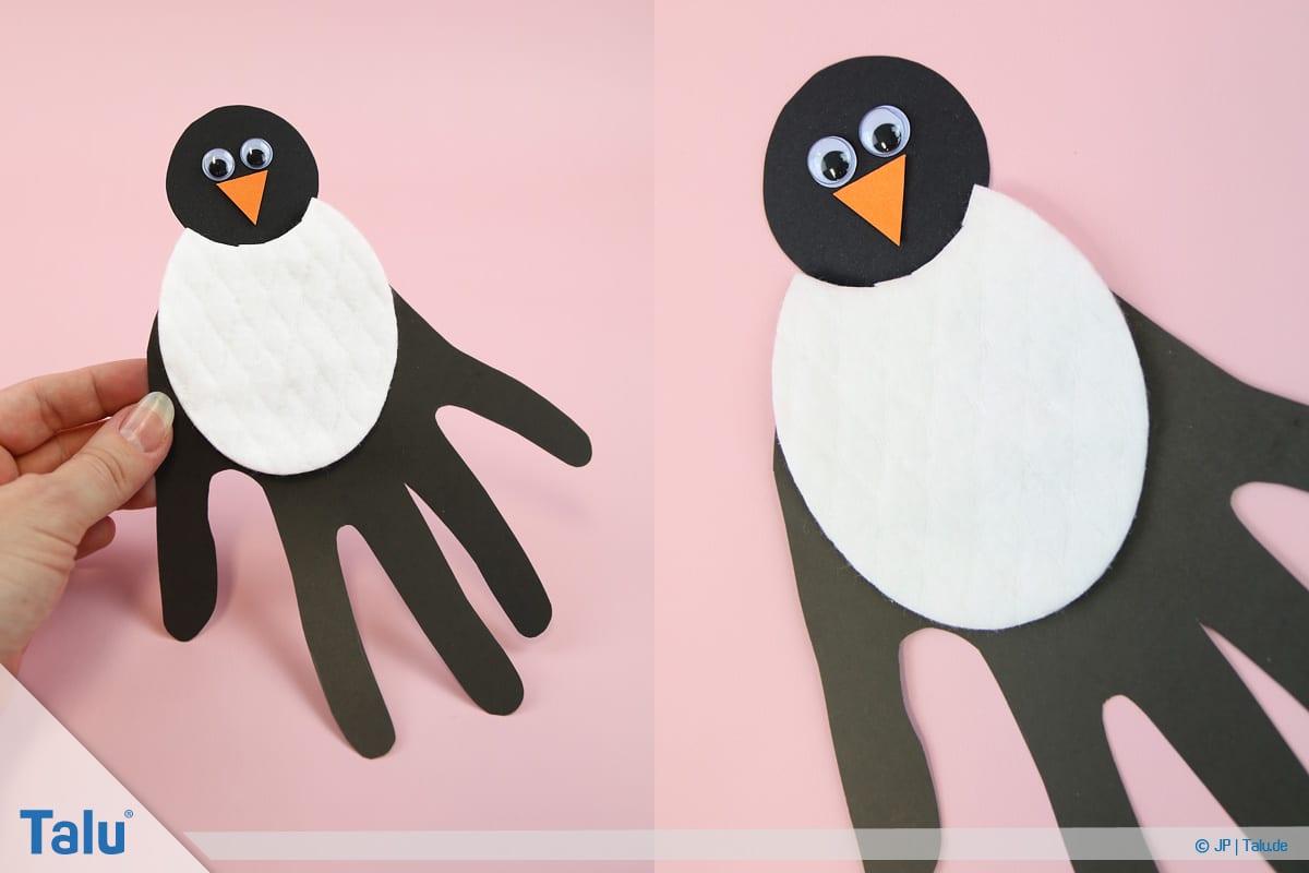 Pinguin basteln mit Kindern, Anleitung, Pinguin aus Handabdruck, fertiger Pinguin, Variante 3