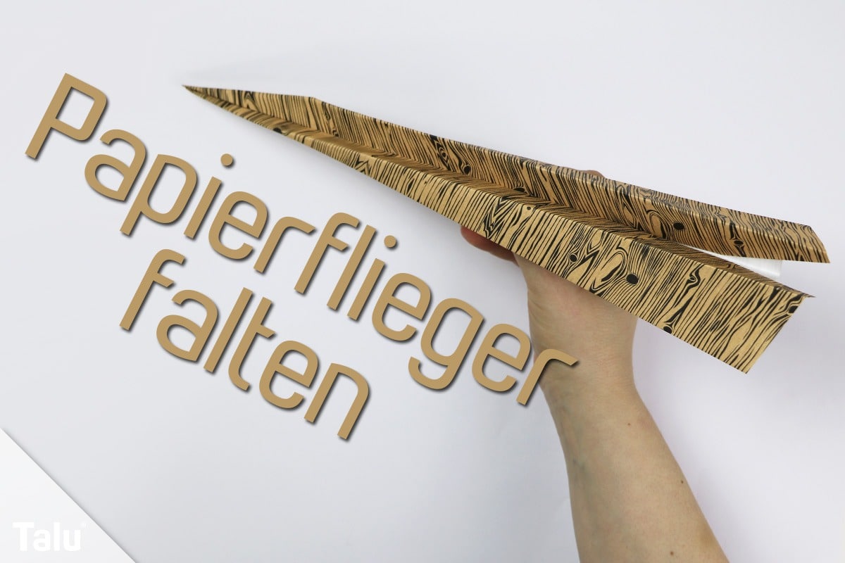 Papierflieger falten