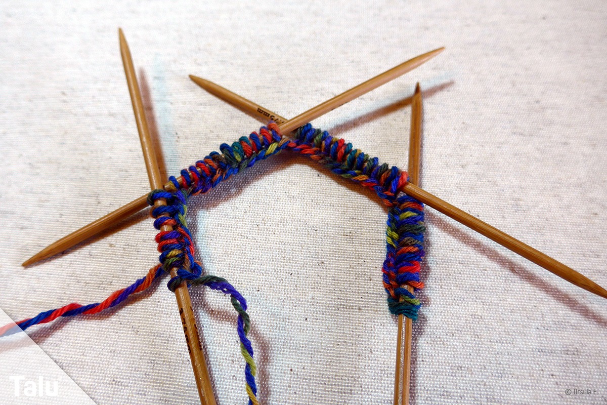 Vier Stricknadeln