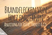 Brandflecken von Holz entfernen